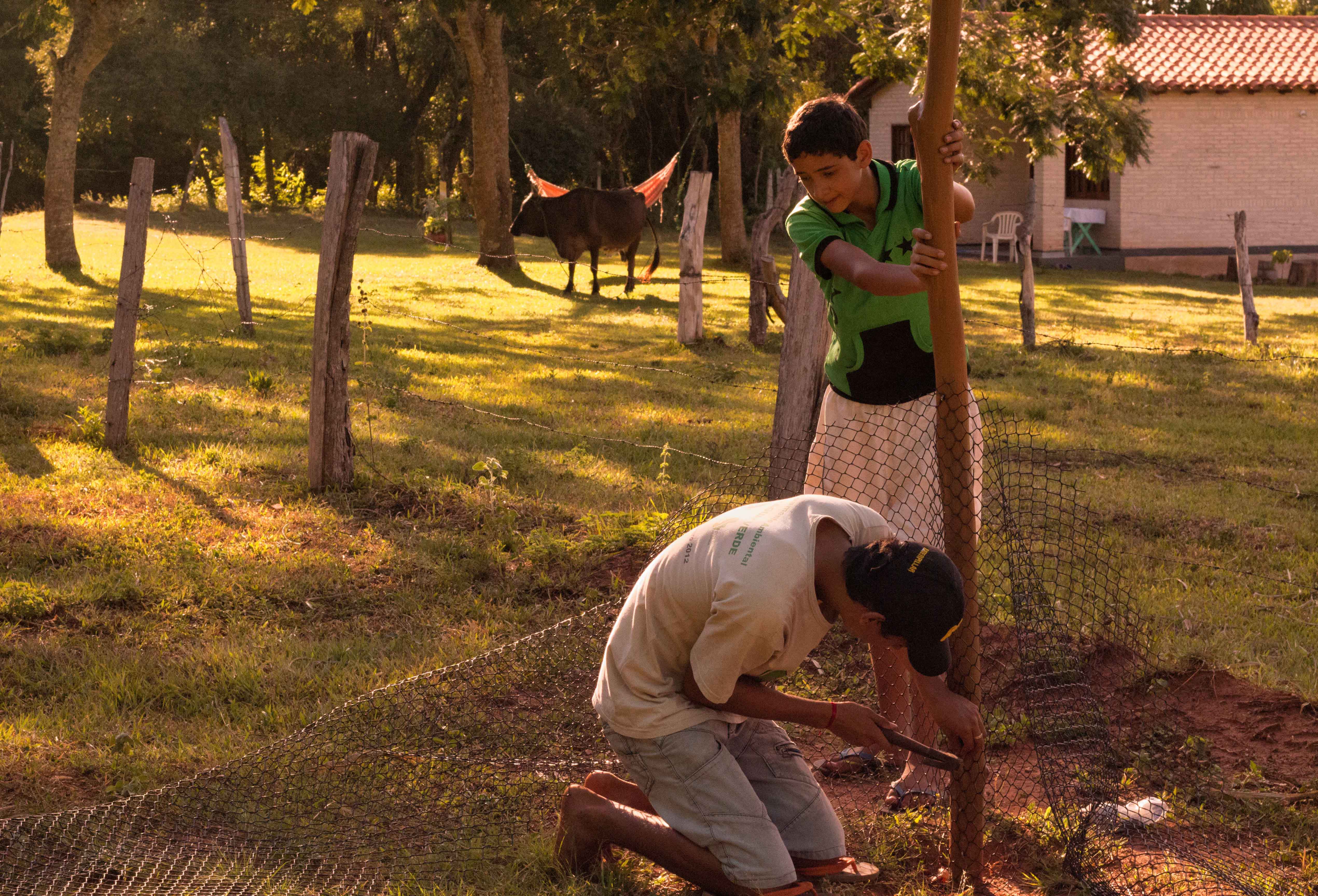 Capilla Cue Youth Helping Make Garden