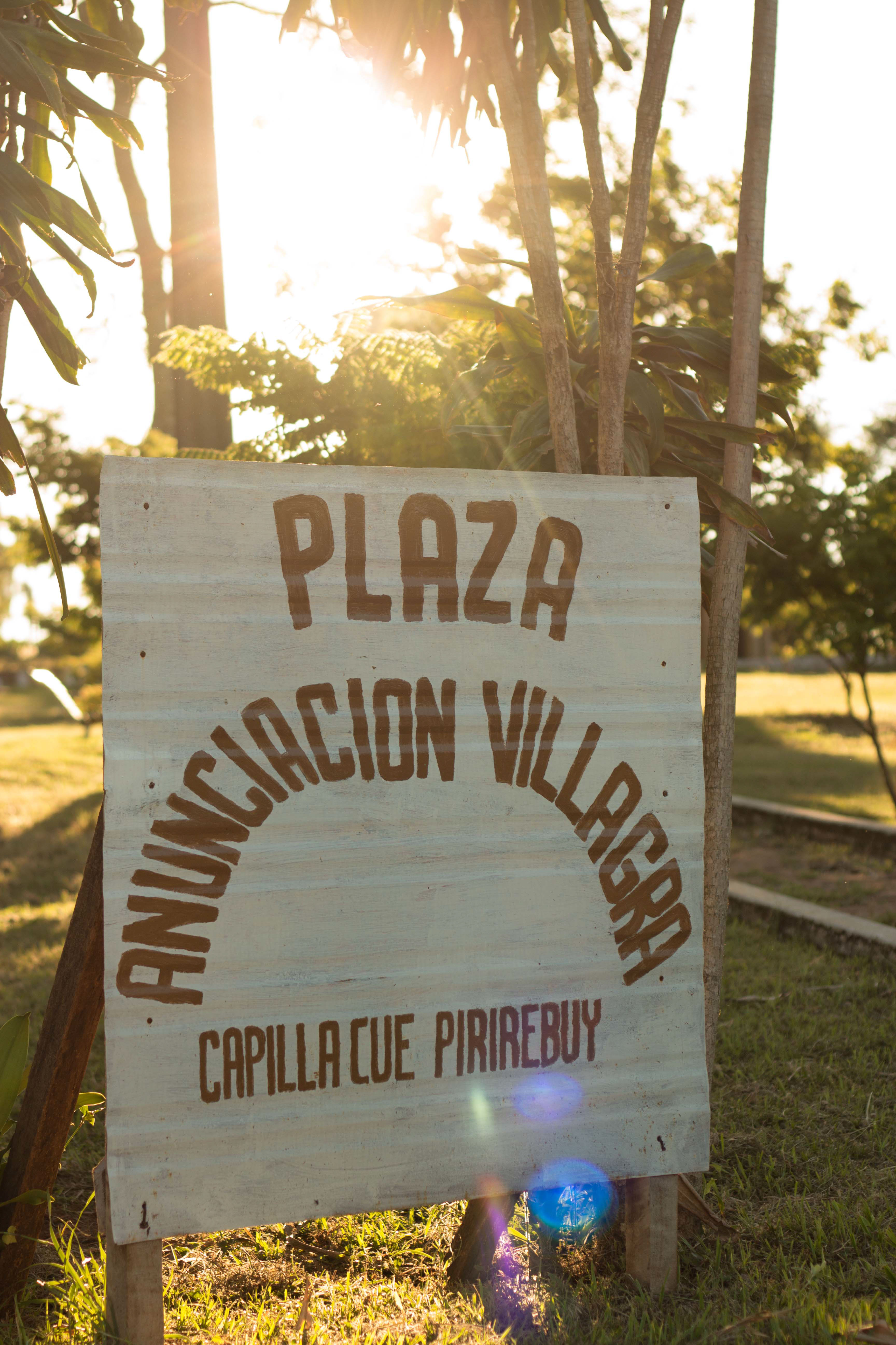 Capilla Cue New Plaza Sign